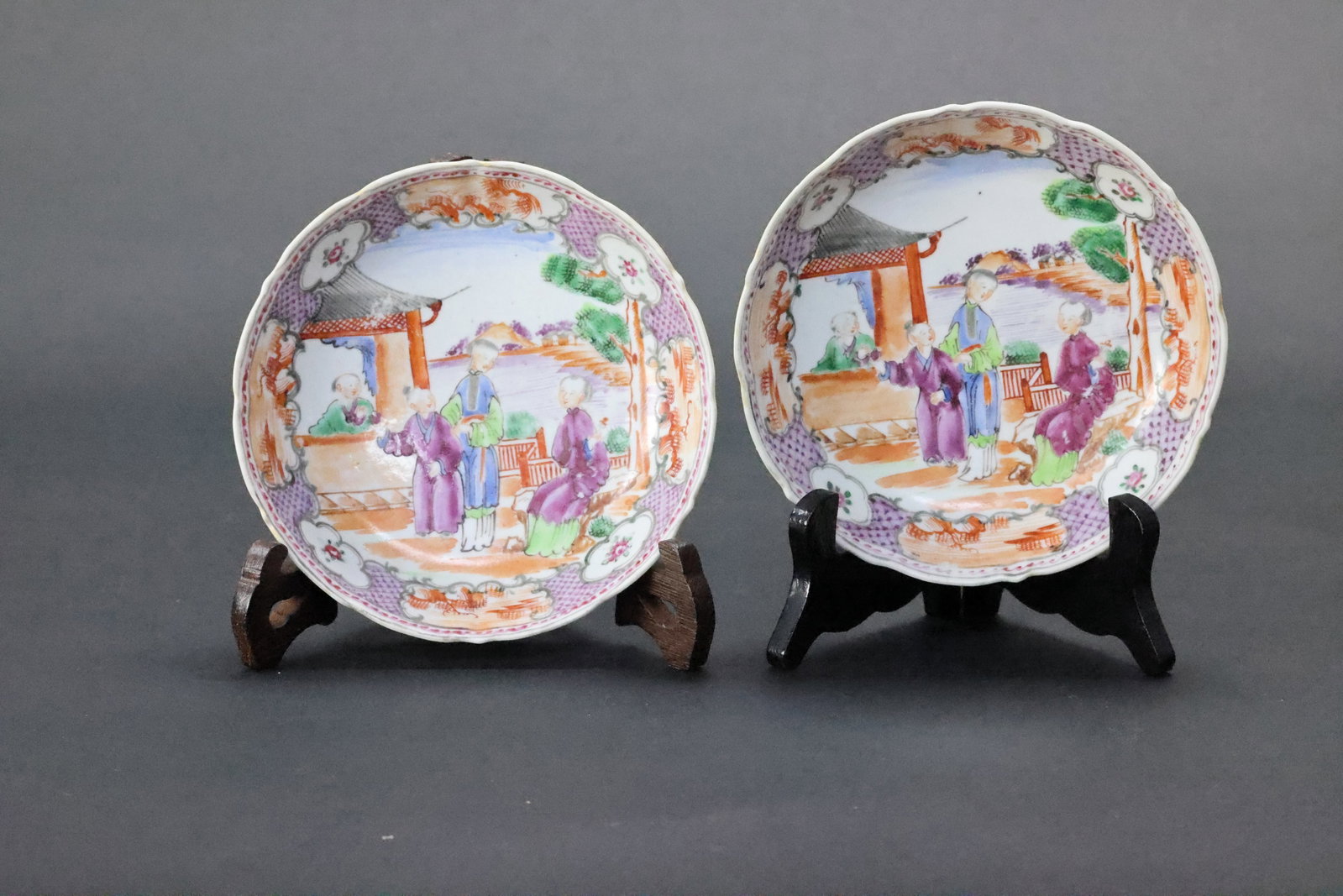 A Pair of Canton Famille Rose 'Courtly Narrative' Windowed Foliate Dishes, Qing Dynasty,: Estimated Date: Jiaqing to Daoguang period, Qing Dynasty (early to mid-19th century). An export famille rose Canton enamel porcelain lobed dish.Attribution: This finely potted Guangcai (Canton enamel)