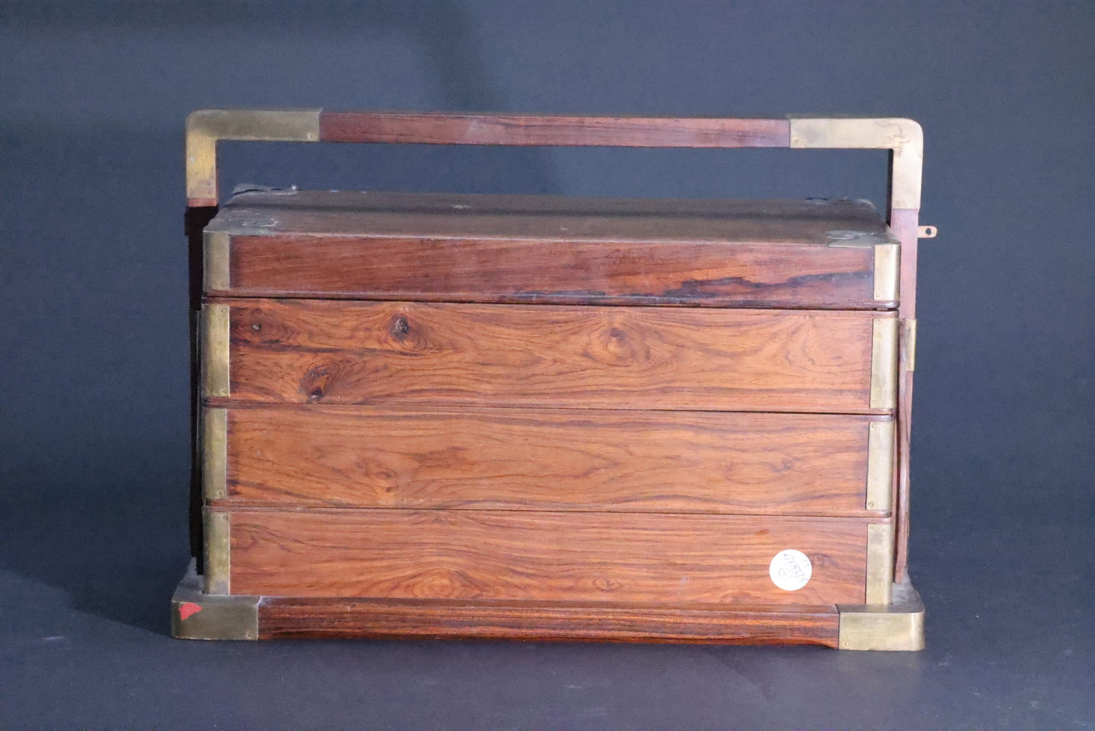 A Huanghuali Three-Tiered 'Scholar's Treasures' Carrying Box, Qing Dynasty (1 of 9)