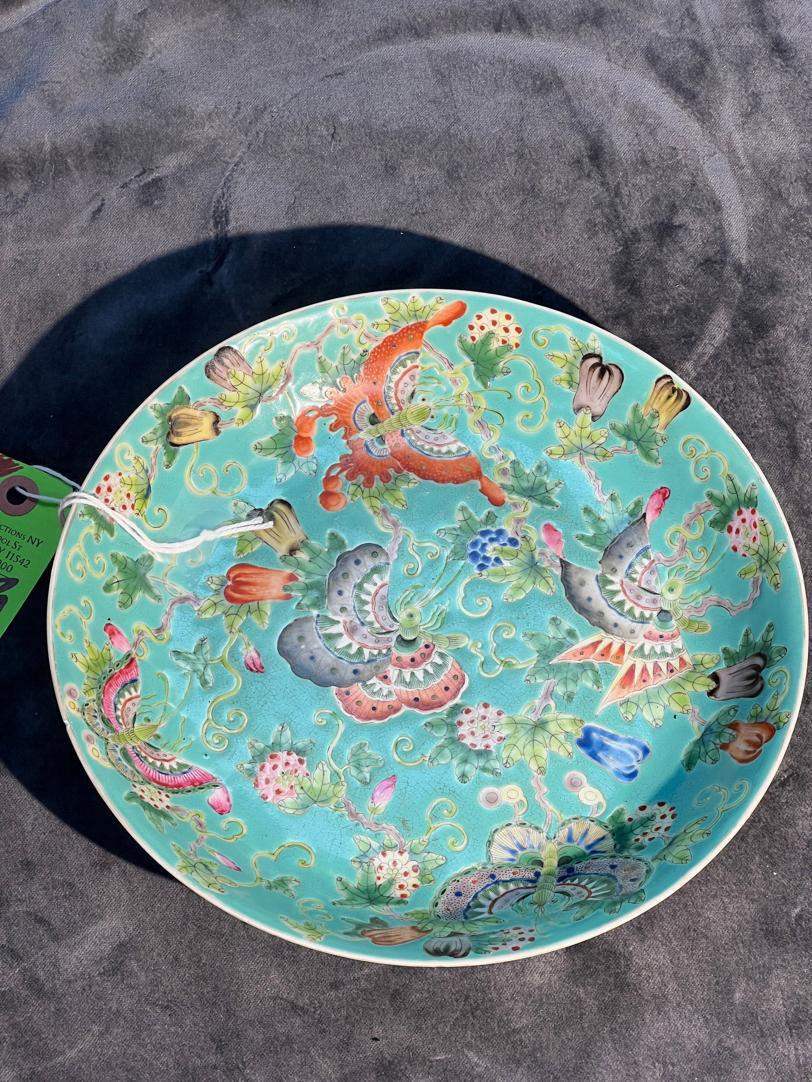 Turquoise-Ground Famille Rose 'Melons and Butterflies' Charger: Auction Reference: Authentic Jiaqing-period Qing imperial famille rose chargers of this design have realized tens of thousands of RMB at auction. Comparable modern reproductions typically trade in