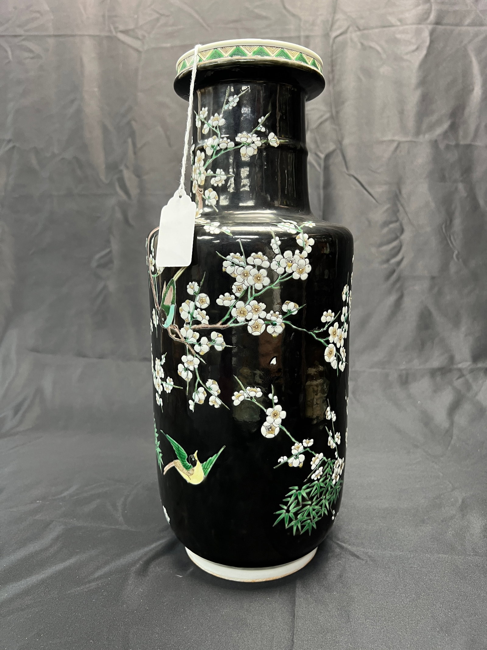 Black-Ground Susancai 'Magpies Among Plum Blossoms' Rouleau Vase: Auction Reference: Authentic Qing Dynasty black-ground susancai rouleau vases of this type have realized tens of thousands to well over one hundred thousand RMB at auction, depending on rarity,