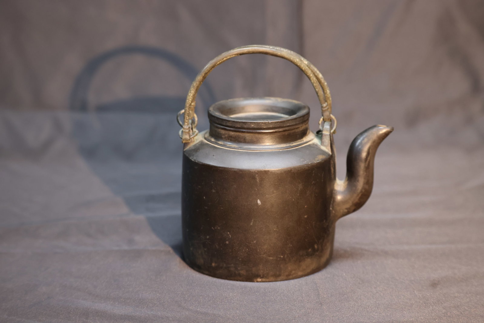 Late Qing Black Clay Yixing Teapot with Copper Swing Handle (1 of 4)