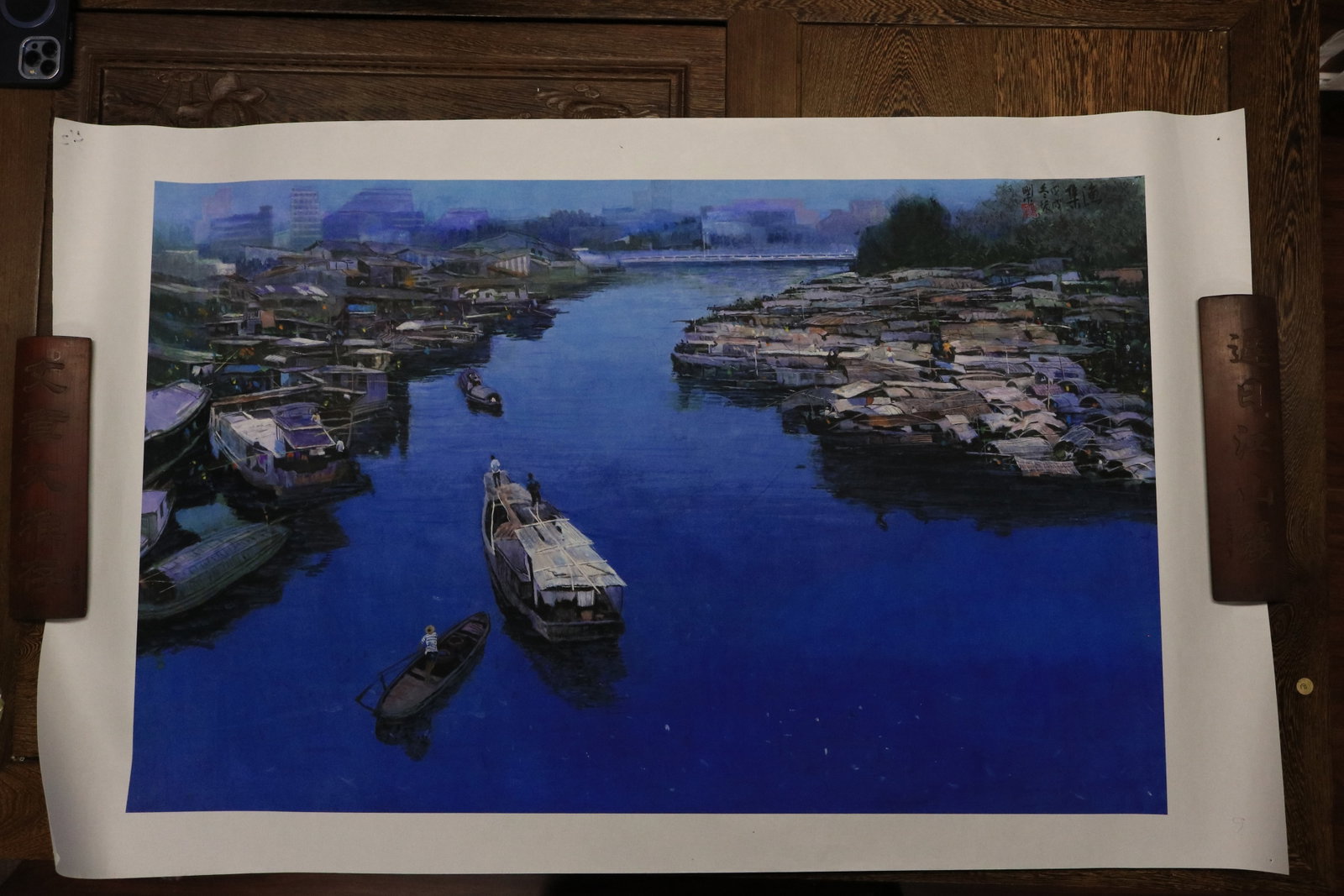 Jiang Zhenguo, Gathering of Fishermen: Waterscape in Ink and Color on Paper: Composition: Executed on a full four-foot sheet of paper, this contemporary ink-and-color painting depicts a vibrant waterside fishing community. A richly saturated cobalt-blue river dominates the com