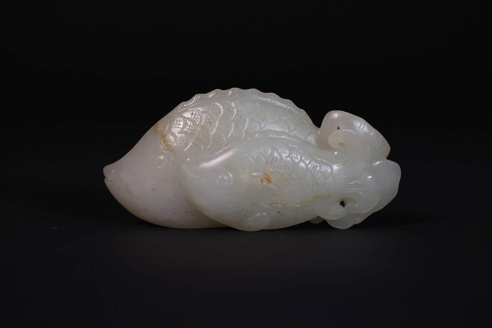 Carved White Jade Double?Fish Handpiece: Natural patina, otherwise in excellent condition H 4cm W 8.5cm