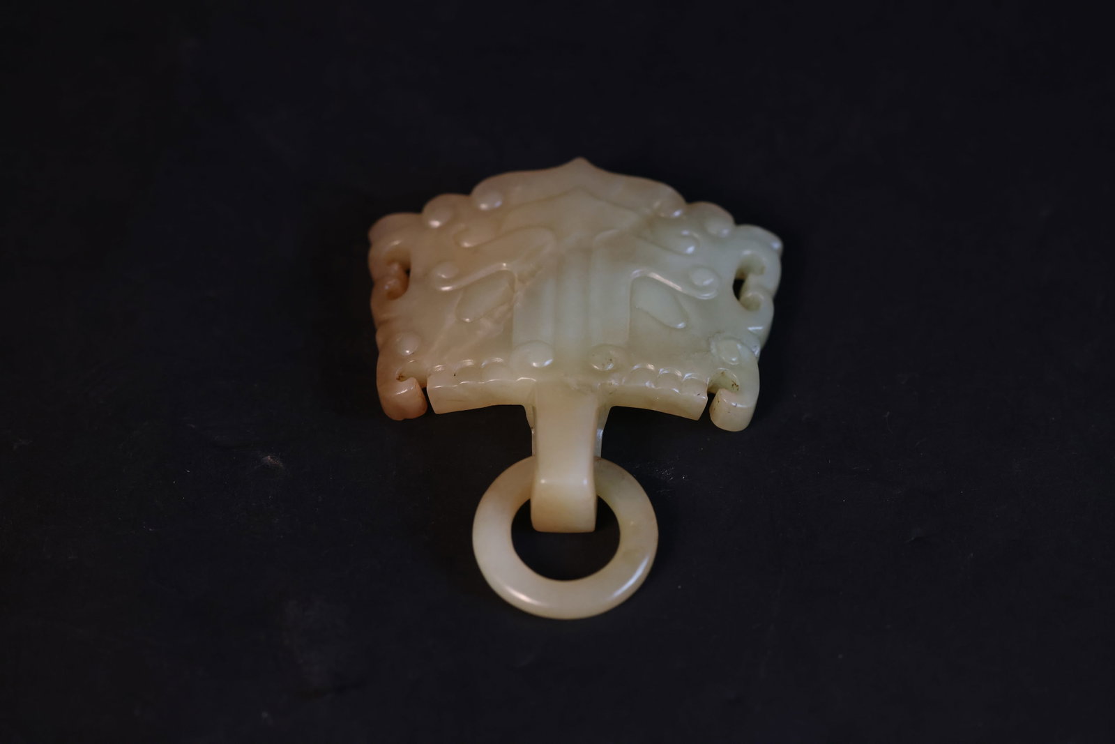 Pale Celadon-White Jade Taotie Mask Pendant with Movable Ring: H 9cm W 7.5cm