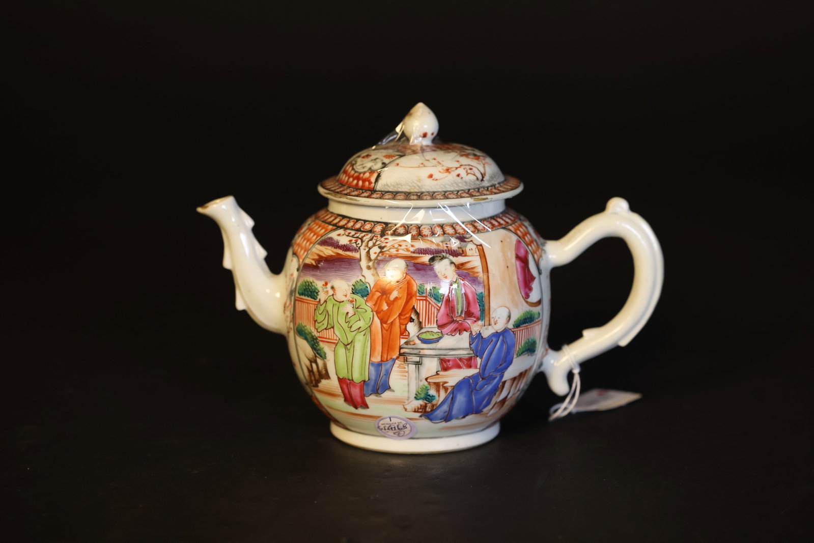 18th-Century Chinese Famille Rose Figural Teapot, Export Porcelain: Naturally aged with wear and color loss, signs of use, handle restored, otherwise in excellent condition. H 16cm. W21.5cm