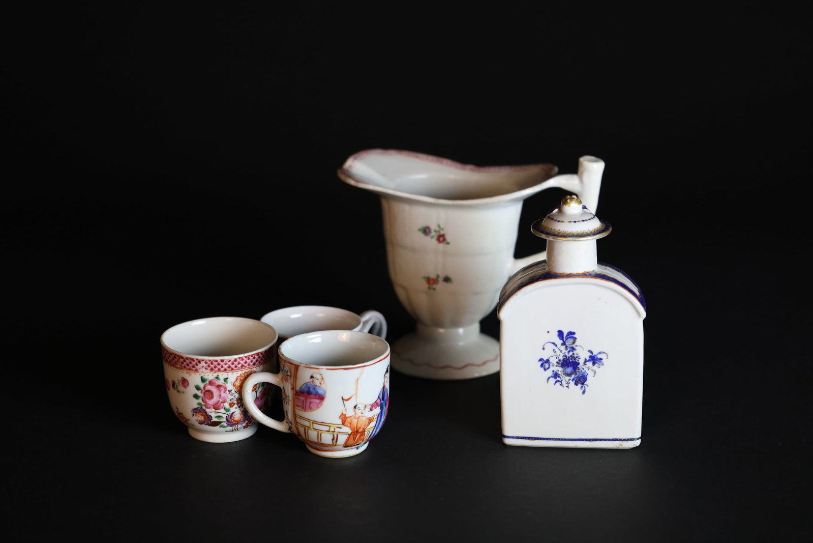 Lot of 18th-Century Teaware: 3 Cups, 1 Creamer & 1 Lidded Tea Caddy: Shows natural age-related wear, with a firing line that has been restored. ?????H 13.5cm?W 16.5cm ?????1??H 5.8cm?W 6cm? ?????2??H 5.7cm, W 6.5cm? ?????3?H 5.6cm?W 6.5cm? ??????H 14.2cm?W 8cm