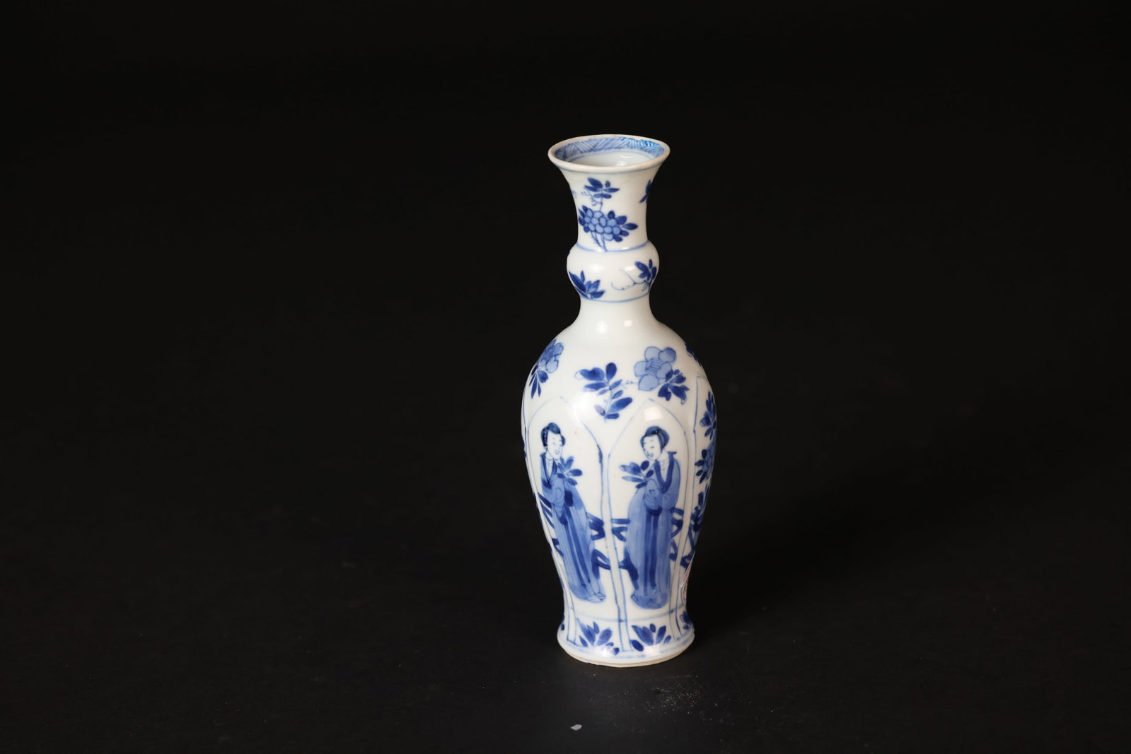 Qing dynasty blue-and-white Guanyin vase with figural and floral decoration, 'Yu' mark: There is a small flake to the foot rim measuring 0.3 x 0.2 cm, with several minor pinhead nicks. The foot ring has a tiny chip of 0.1 x 0.15 cm. The rim has a restored area measuring 2 x 1 cm. Otherwi