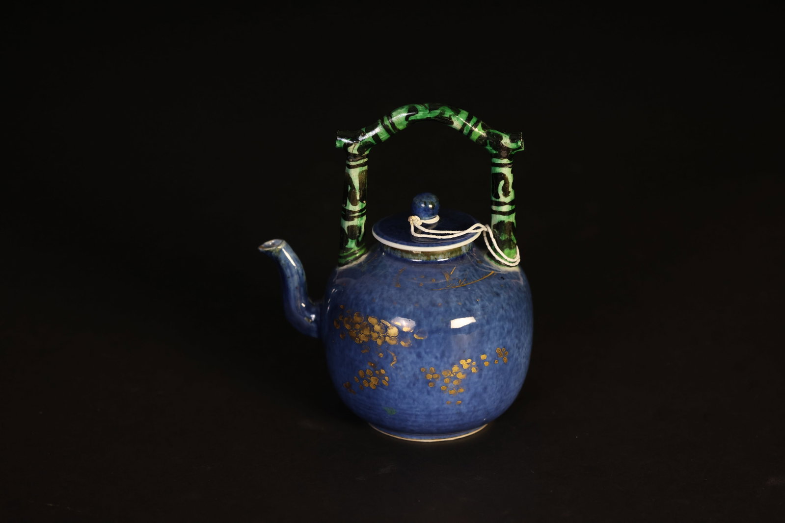 Early Qing Splashed Blue Glaze with Gilt Plum Blossom Top-Handled Ewer: Naturally aged with some gilt loss; a small chip to the spout. H 15.5cm W 13cm