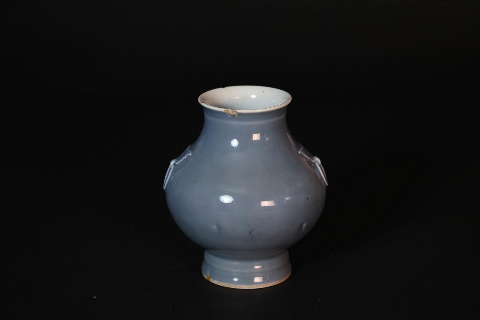 Late Qing blue-glazed lug-handled bottle with "Da Qing Kangxi Nian Zhi" reign mark: H 19.5cm W 15.5cm