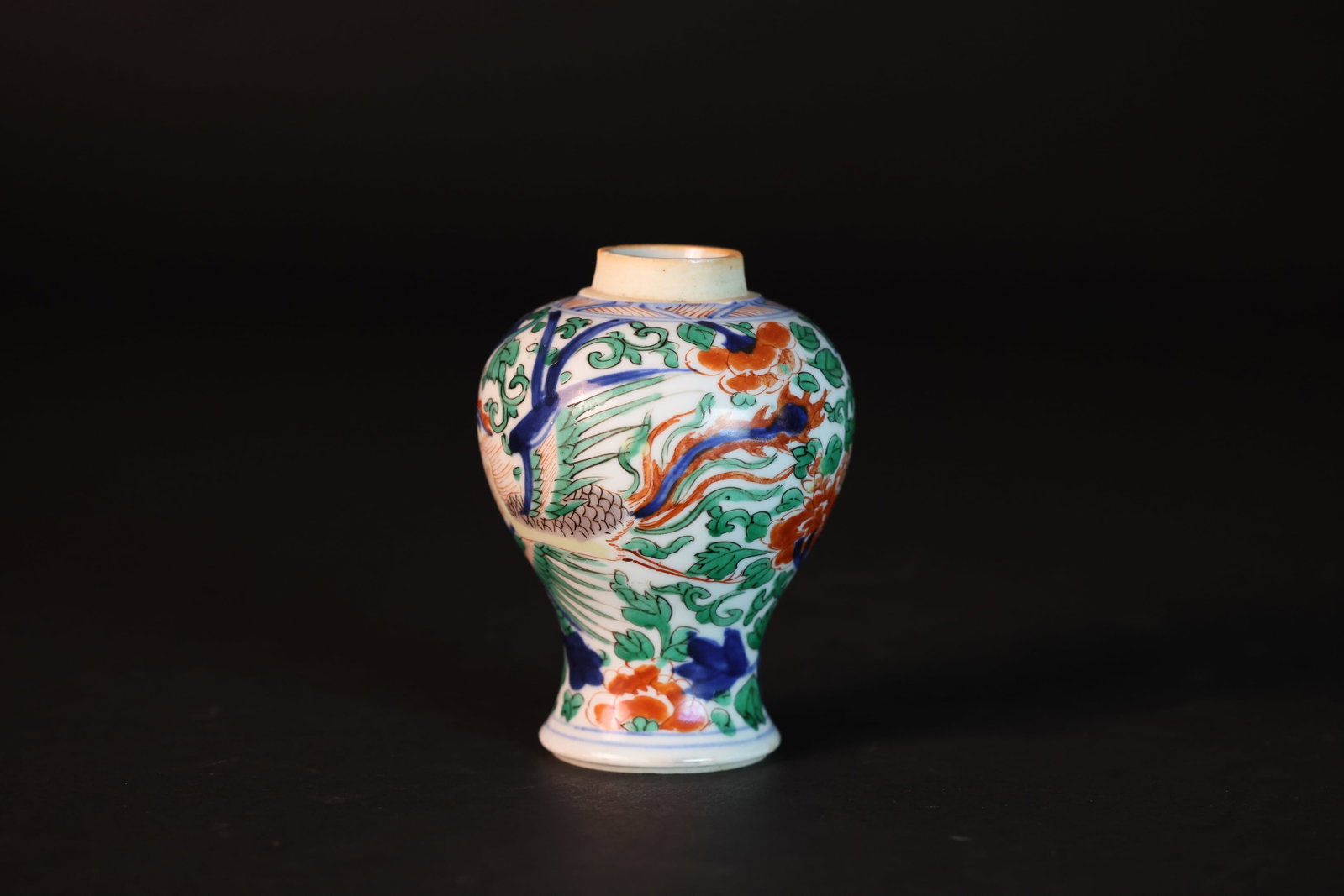 Chinese Underglaze-Blue and Polychrome Small Meiping (Plum) Vase, Phoenix and Peony Decoration: Naturally aged with some patina and minor color loss; two small chips to the footrim (each about the size of a rice grain), and one additional chip with an old adhesive residue of similar size; otherw