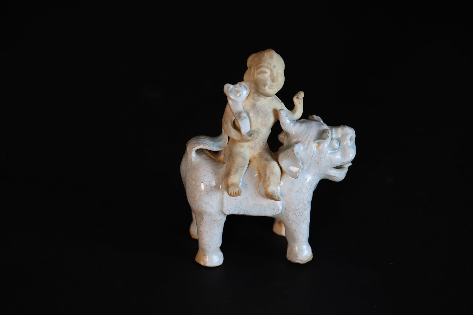 Yuan-Ming Dynasty Qingbai-Glazed Porcelain Statuette of a Boy Riding a Mythical Beast (1 of 7)