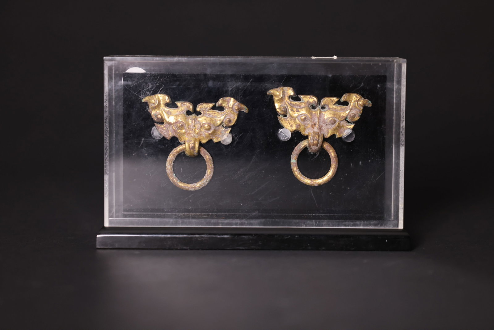 Pair of Han Dynasty gilt-bronze beast-mask appliques (1 of 6)