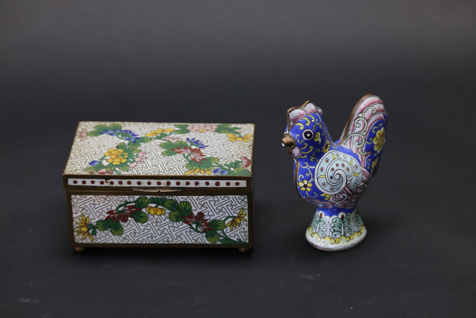 1. Republic of China cloisonné floral covered box, "CHINA" mark 2. Copper-bodied painted enamel: 1. Naturally aged with patina and rust; a 0.3 x 0.2 cm area of enamel loss to the base; a 1.2 cm circular area of enamel loss and minor flaking to the interior of the box. 2. Naturally aged with patin