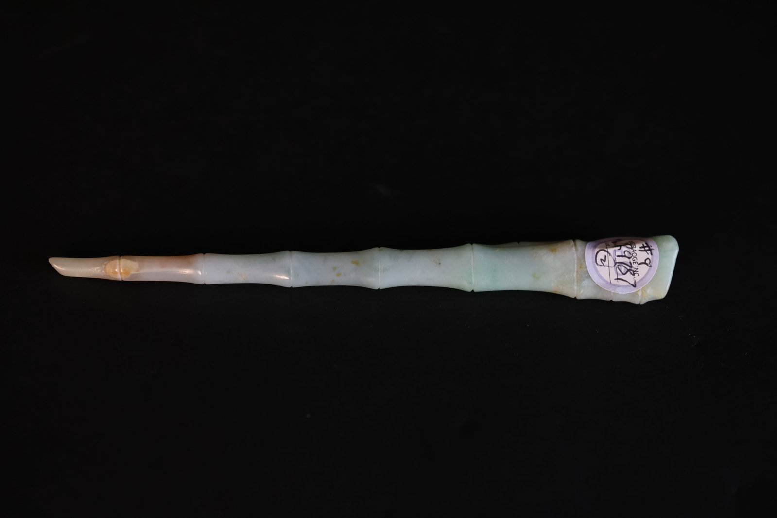 Qing Dynasty Jadeite Bamboo-Form Hairpin: Natural stone grain, naturally aged, patina, otherwise in excellent condition. H 16cm W 2.1cm