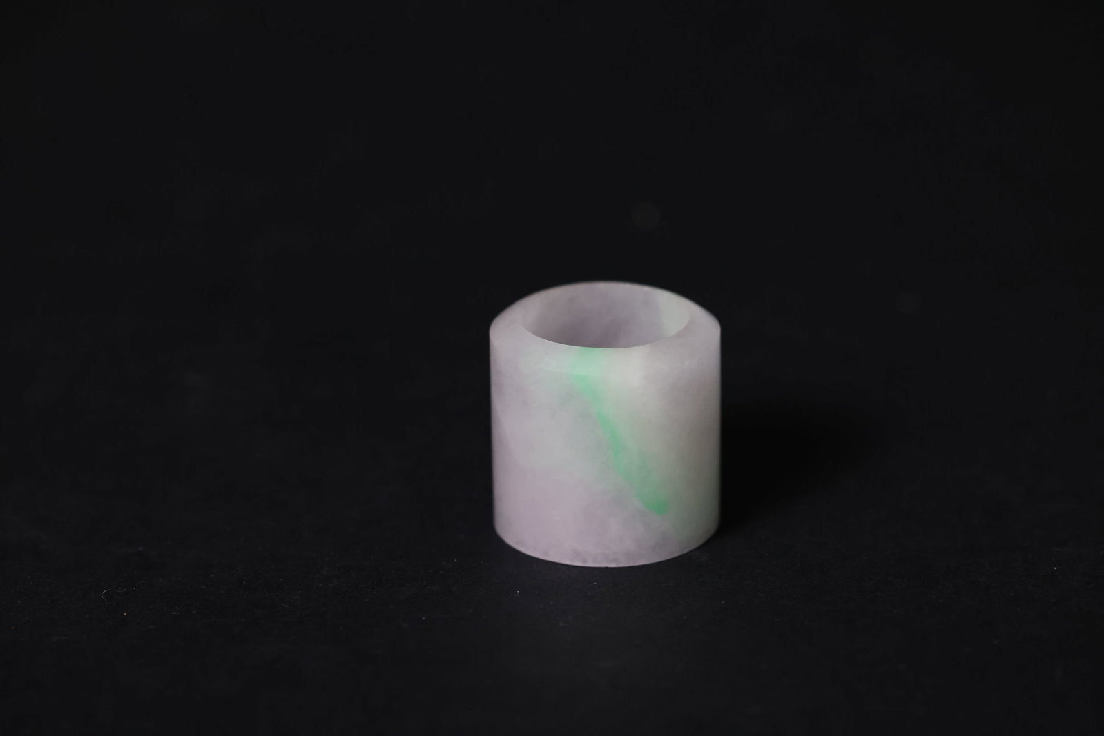 Jadeite Thumb Ring: Naturally aged with patina, otherwise in excellent overall condition. H 3.1cm W 3.1cm