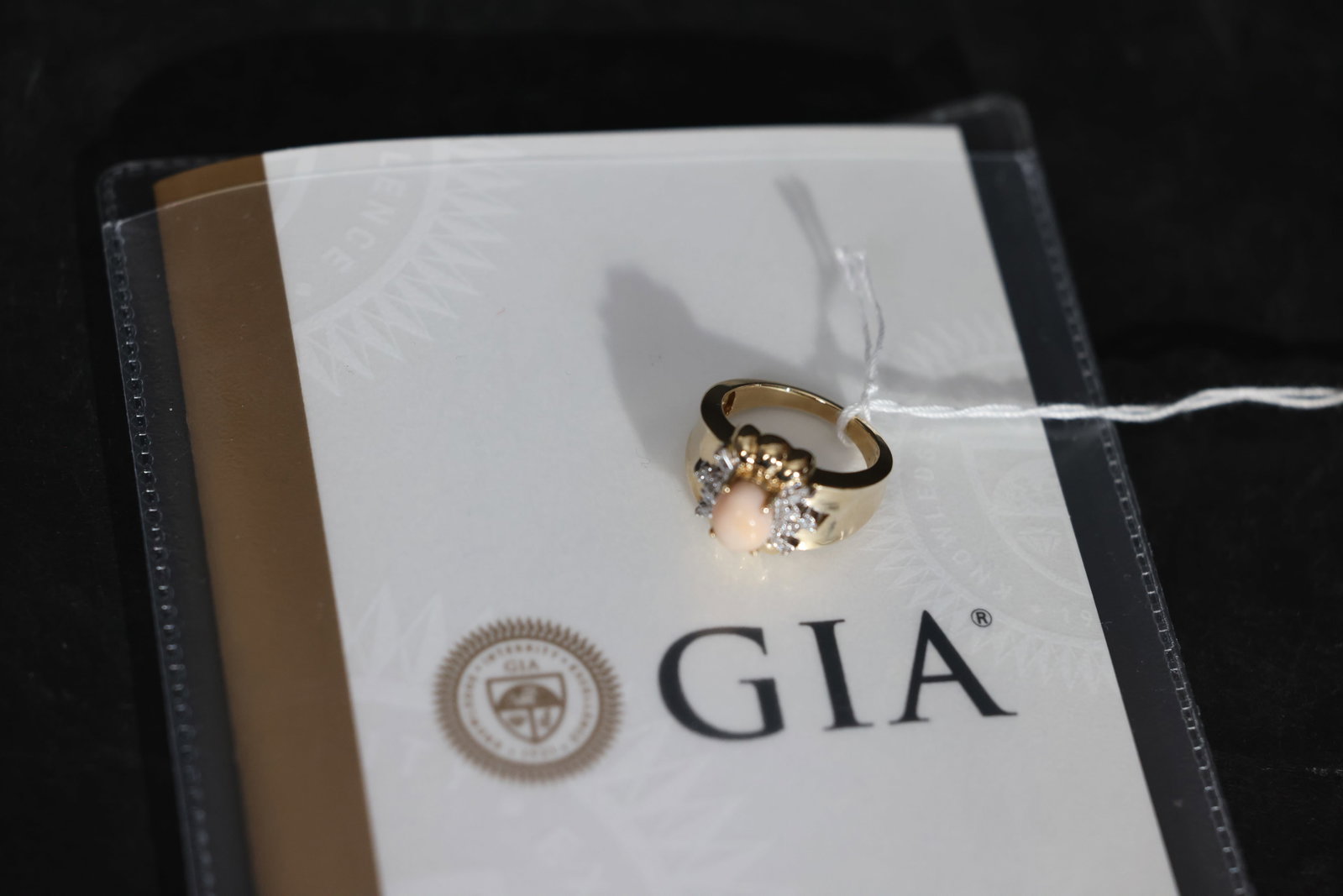 14K Gold Natural Conch Pearl and Diamond Ring, GIA-Certified: The coral is intact with no chips, the diamonds are securely set, and the ring mount shows minor wear consistent with use, with no signs of metal cracks. Weight: 2.12 carats (8.48 grains);
