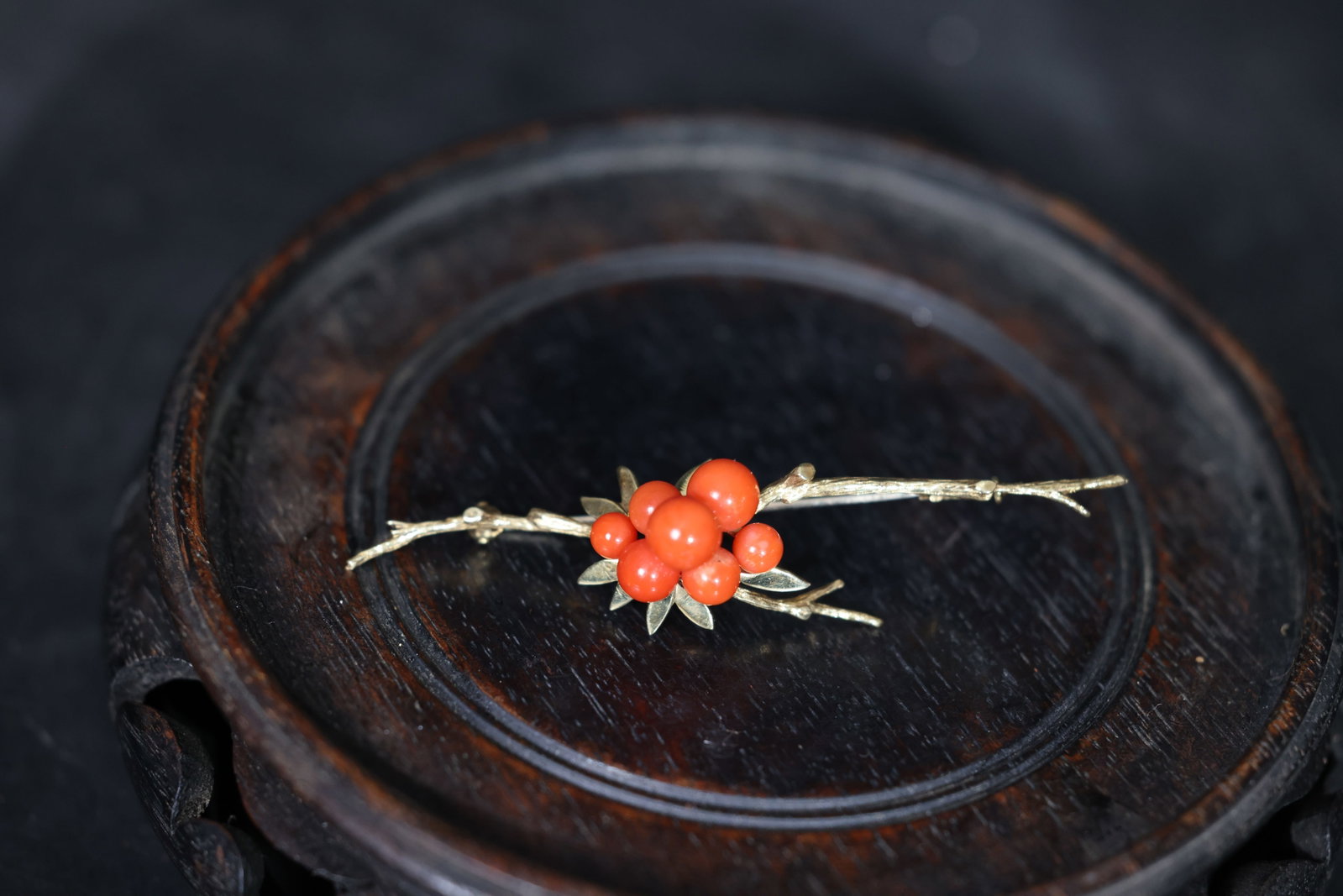 Antique 14K Gold Coral Berry Branch Brooch: Coral beads are intact with no major chips or cracks, displaying natural growth patterns on the surface. The gold fittings show minor wear consistent with age. The pin mechanism opens and closes