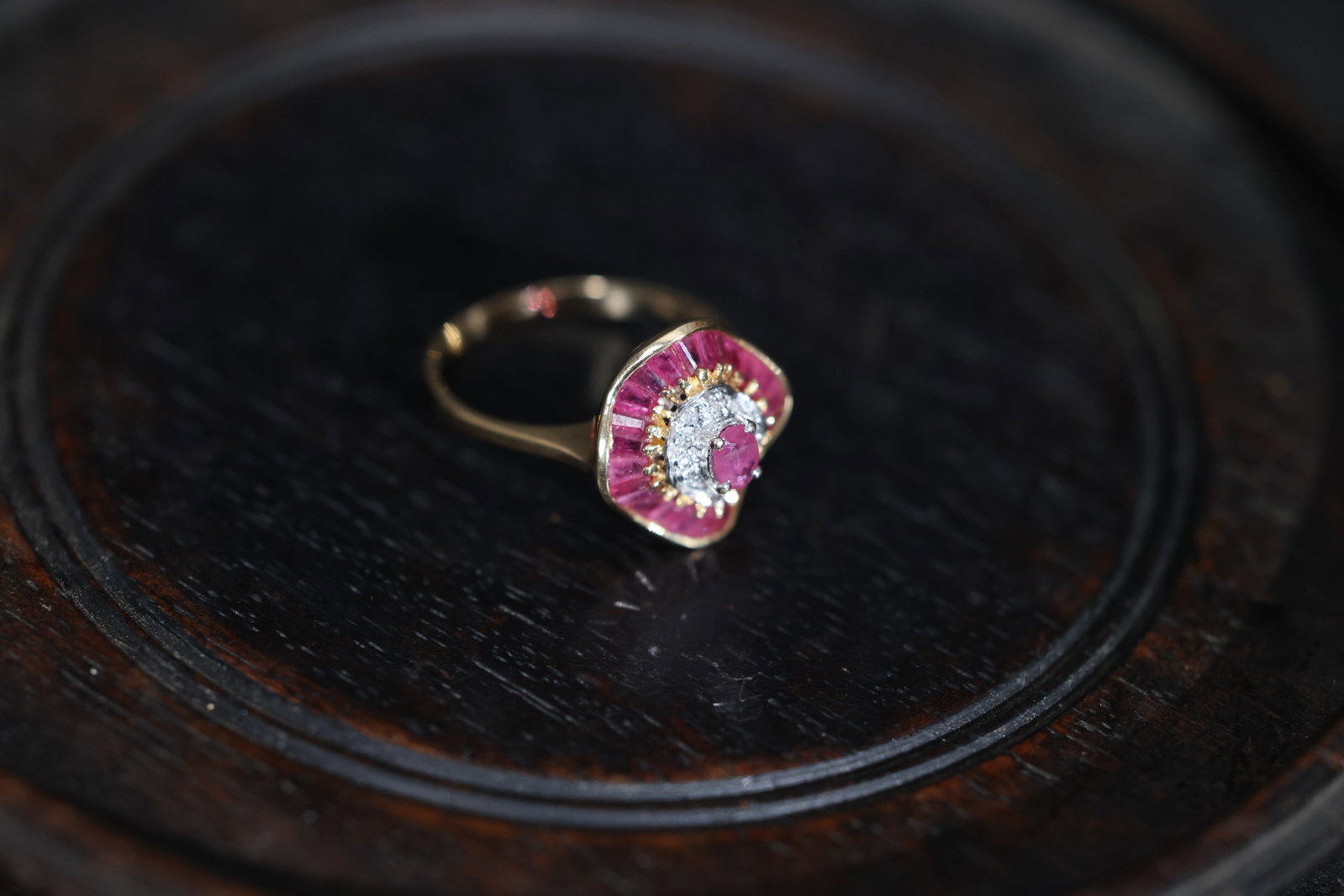 Antique 14K Gold Fan-Shaped Ruby and Diamond Ring: All gemstones are present and intact, with natural inclusions visible in the rubies. The metal shows normal age-related wear. Prongs are secure with no significant deformation. Weight 3g