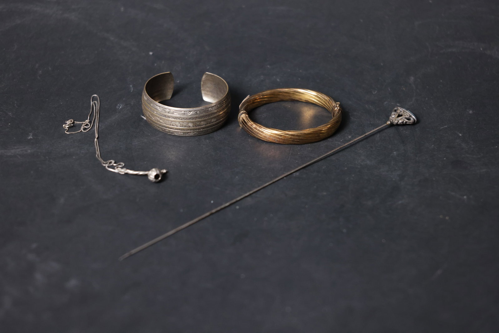 Group of Antique Silver Jewelry (Set): Overall intact. Silver components show oxidation and darkening; gilt areas exhibit wear and some loss of gilding. The fine silver chain is delicate and prone to breakage, but there are no major