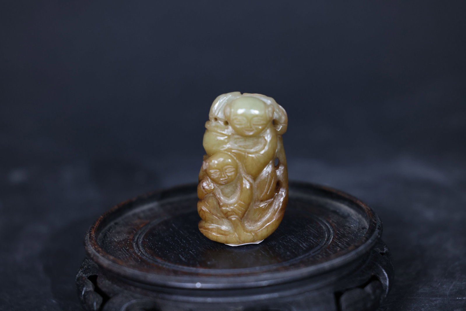 Antique Jade Pendant: Hehe Erxian (Two Immortals of Harmony): Overall intact with some areas showing age-related patina and surface wear consistent with use; no major cracks or significant damage. H 5.8cm W 3.5cm