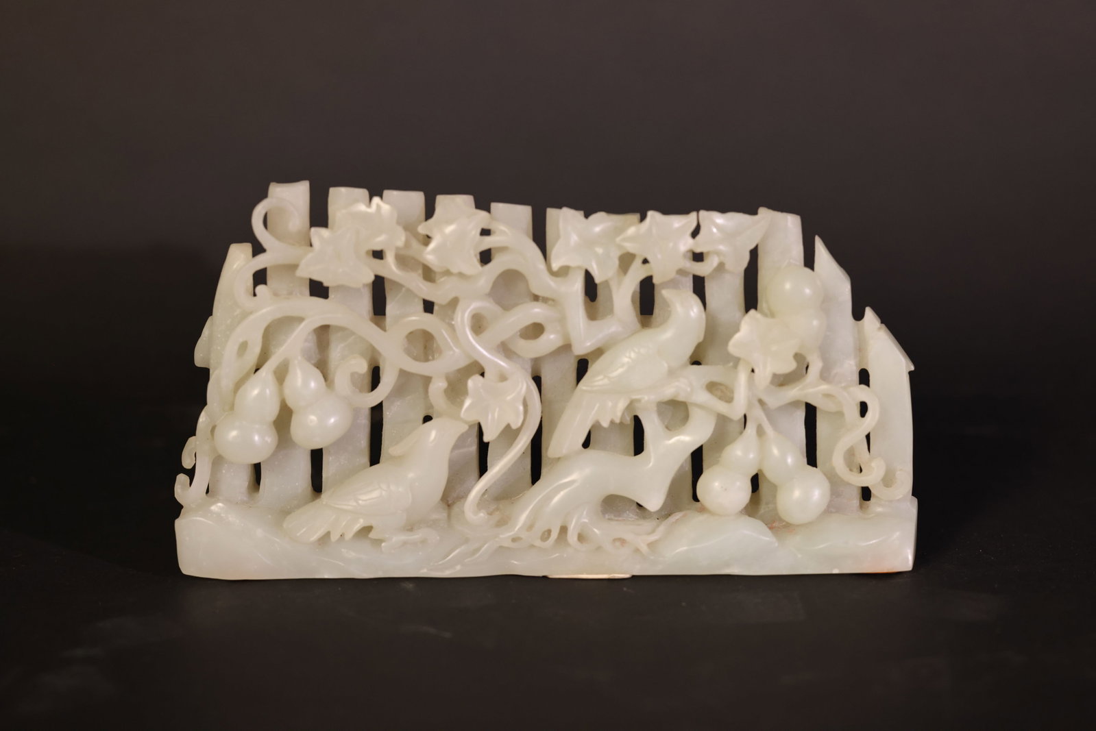 Hetian (Hotan) White Jade Openwork "Fu?Lu?Xi" Birds on Mountain Table Ornament: Overall structure is intact; some minor wear and old nicks to a few vine branches, with no major breaks or repairs. The base shows expected wear consistent with age. H 9cm W 18cm