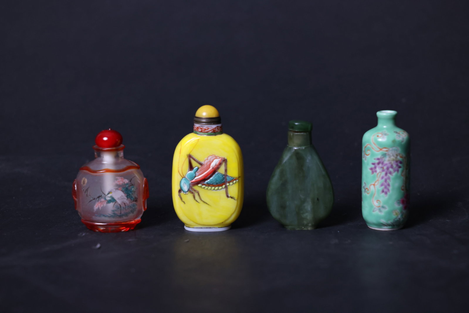 Set of Chinese Snuff Bottles: The set is complete and in overall good condition with no cracks or repairs. The rim of the overlay glass teapot shows minor wear from use. The enamel decoration on the glassware has slight surface we