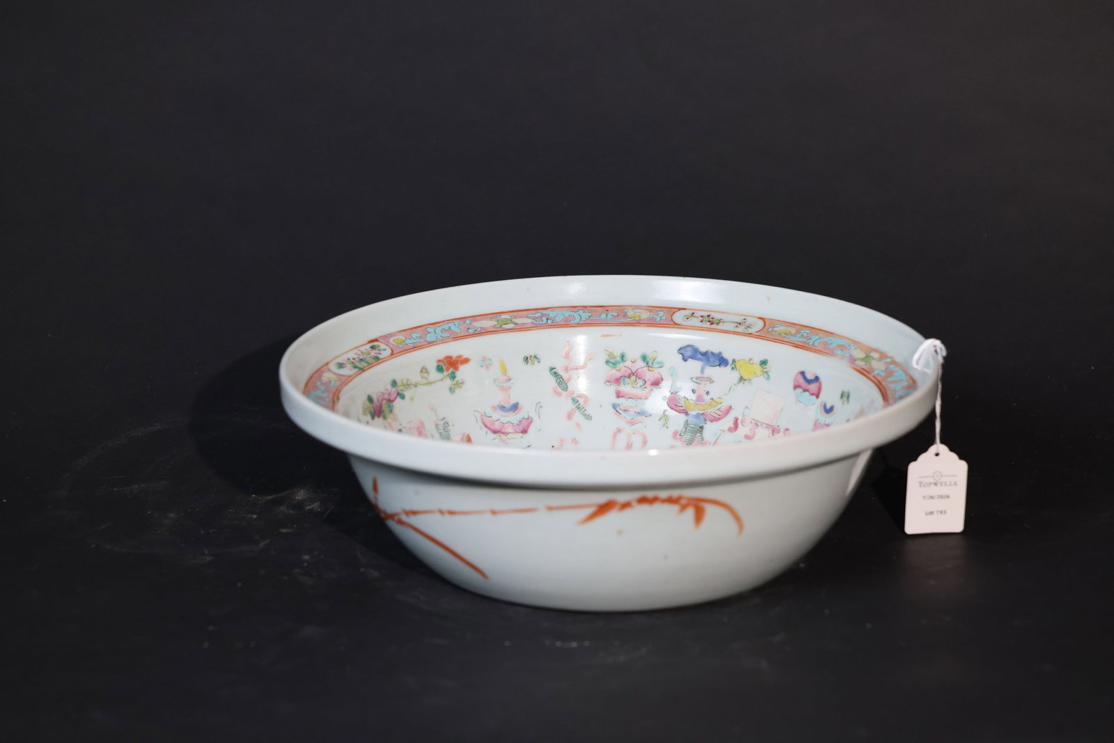 Late Qing Famille Rose Peacock and Archaistic 'Bogu' Pattern Everted-Rim Large Basin: Minor enamel wear and loss to decoration in areas; slight wear to rim consistent with use; no hairlines; natural old chips to footrim; overall in good condition. H 11.5cm W 37cm