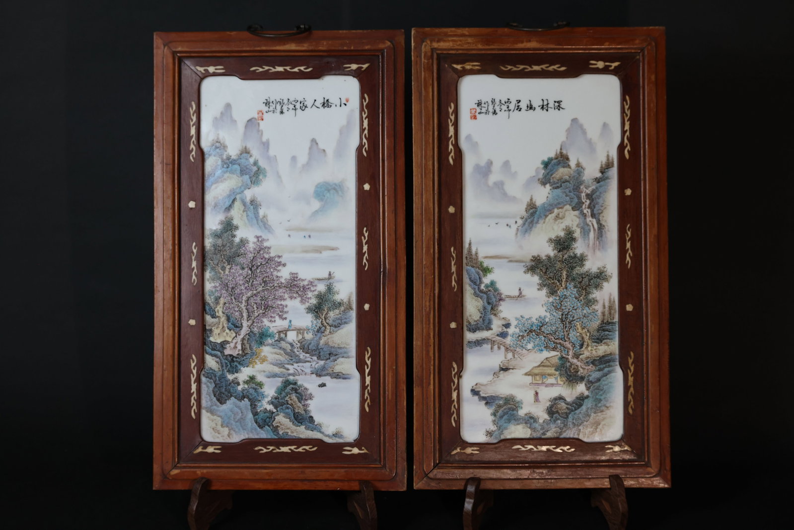 Pair of Famille Rose Porcelain Landscape Plaques, bearing a Zhang Zhitang mark: The porcelain plaque is intact with no cracks or chips, and the enamels are well preserved. The original wooden frame shows signs of age-related wear, with minor losses to some bone inlays. H 58cm W 3