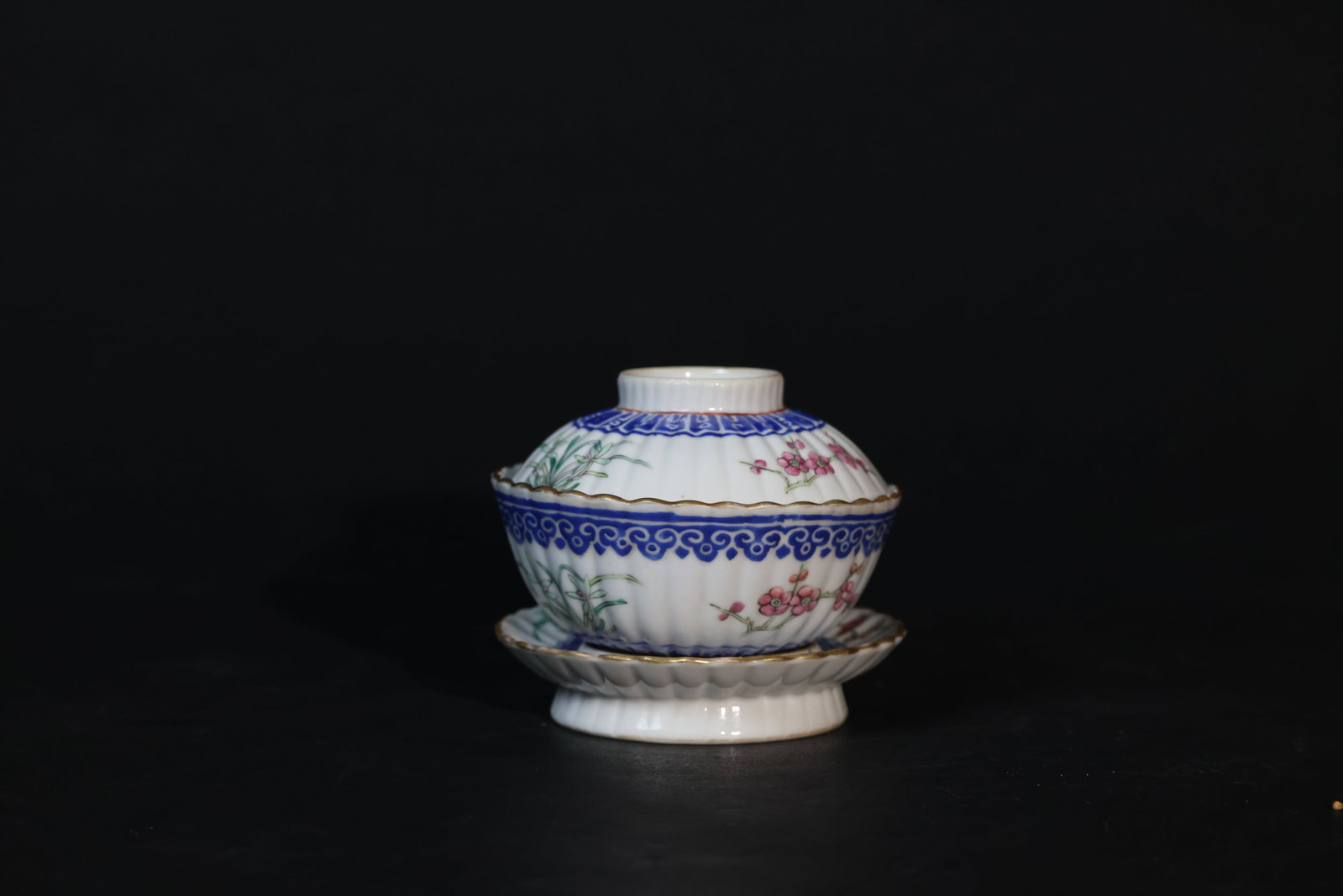 Qing Guangxu Famille Rose Three-Piece Gaiwan with Chrysanthemum-Petal, Plum & Orchid Blossoms: The set is complete and in good condition overall. There is some wear to the gilt rim and minor signs of age and use. No cracks or chips. The enamel remains well preserved. H 9.5cm W 14cm