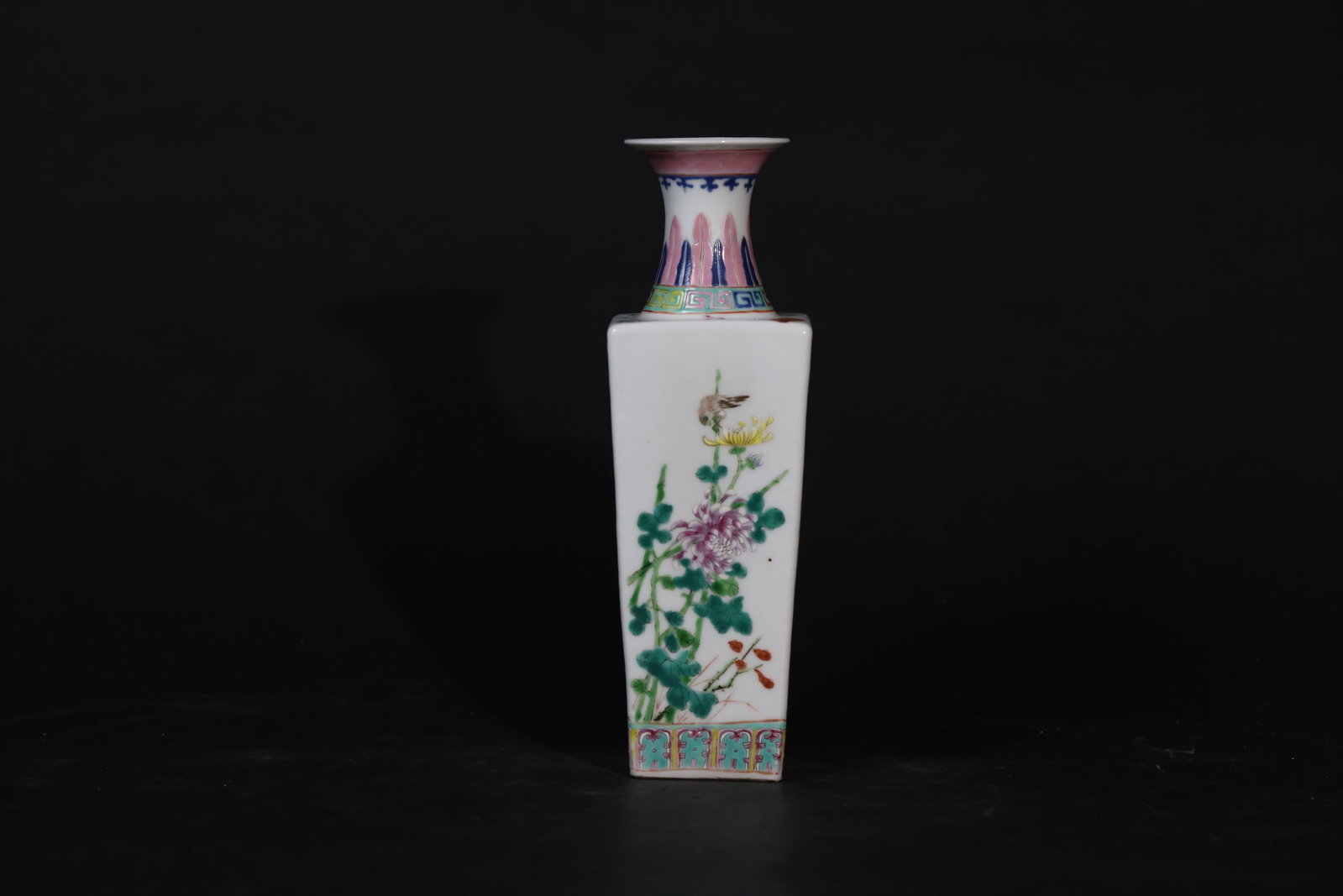 Famille Rose "Four Seasons" Flower-and-Bird Square Bottle, Late Qing-Republican: The piece is intact with only minor wear to the rim; no cracks or chips. The glaze is well preserved, and the foot shows signs of age and use. H 25.5cm W 8cm