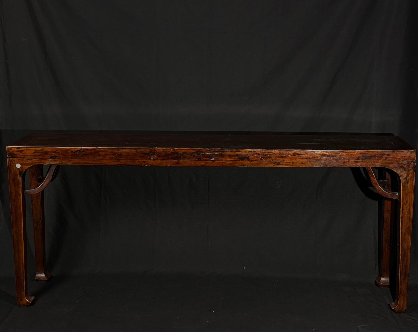 Mid-Qing Ming-Style Long Console Table with "Bawang" Stretchers: Overall structure is solid and intact; the tabletop shows age cracks, old knocks, and wear consistent with age; traces of old repairs to the edges; the original finish on the underside is well preserv