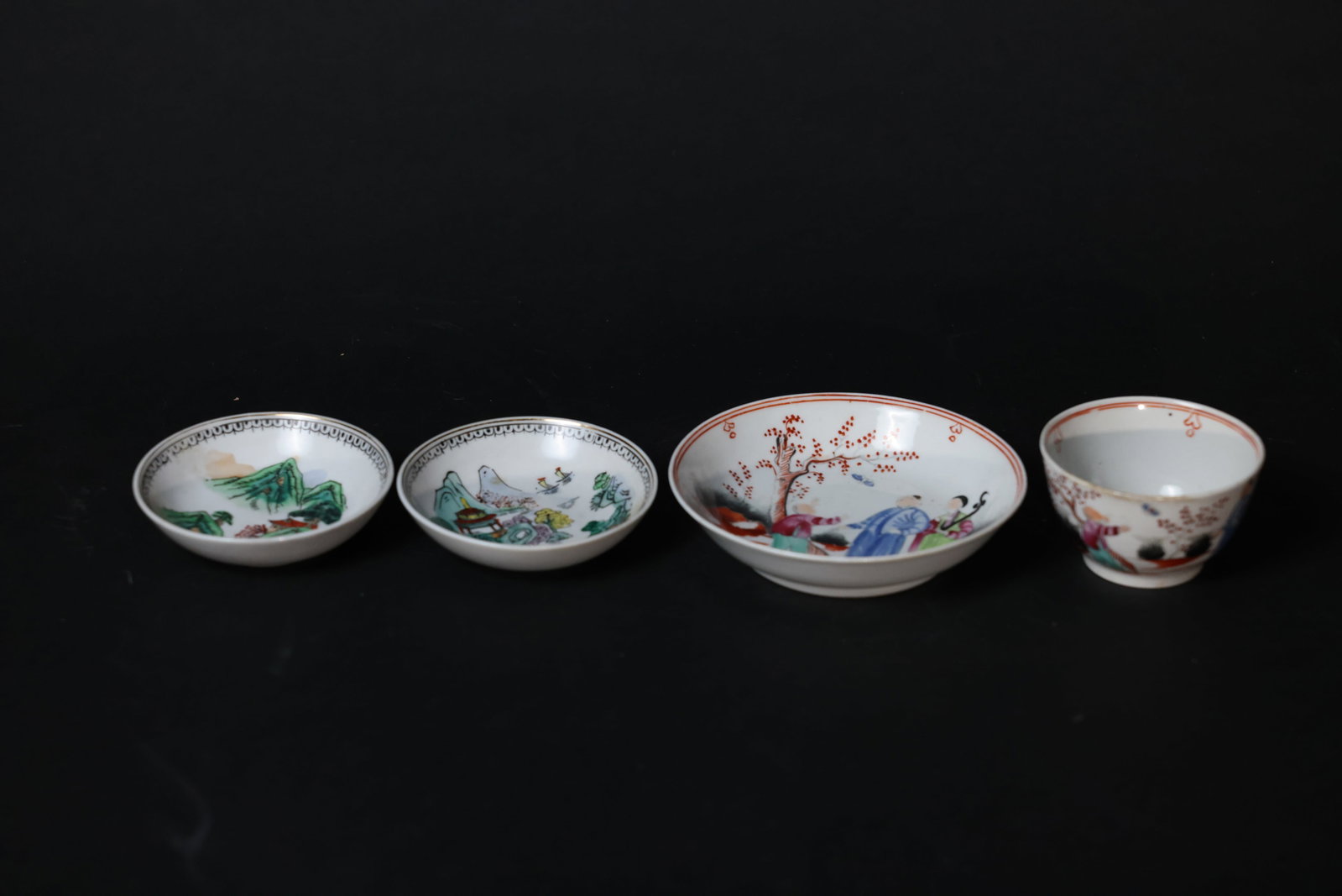 Set of Guangcai (Canton Famille Rose) Export Porcelain: Overall intact with no firing flaws; minor enamel wear to the rim and isolated areas of enamel loss; later-added metal hanging mount, not original to the piece. H 5cm W 13cm
