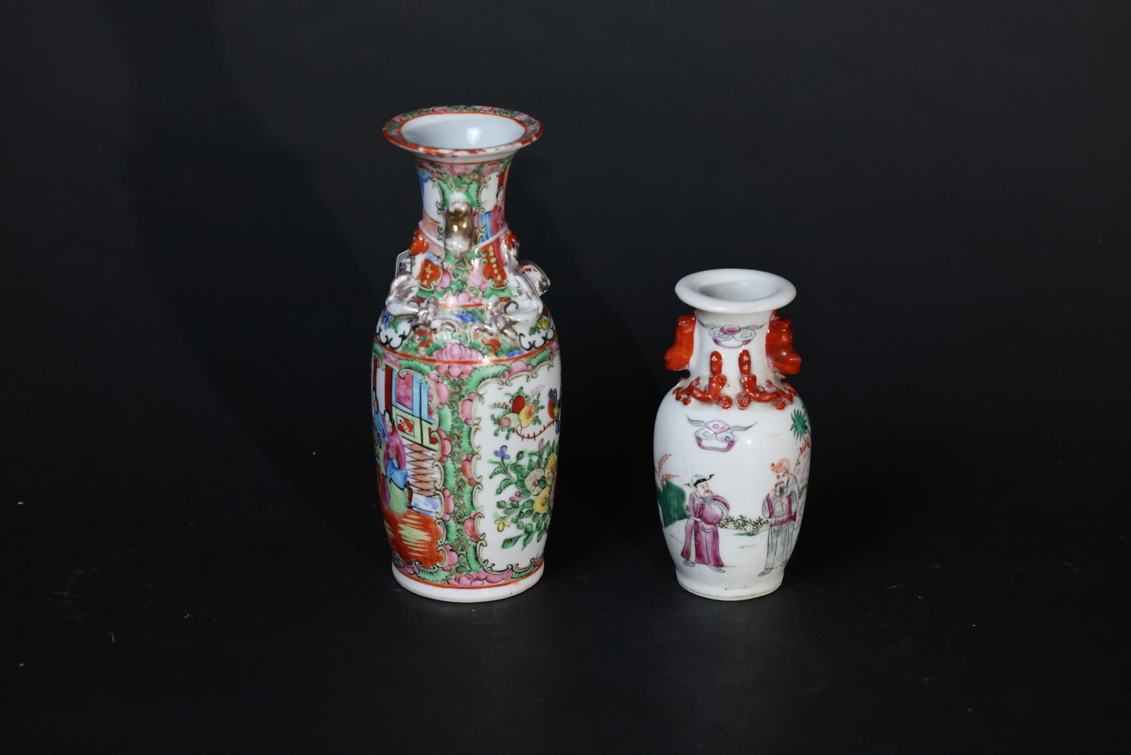 Pair of Qing Dynasty (Tongzhi-Guangxu) Guangcai & Famille Rose Molded Chi-Dragon Miniature Vases: The rim of the Canton enamel vase shows minor fritting and some wear to the gilt; partial enamel loss is present, but the body remains intact with no cracks. The famille rose vase has a small chip to 