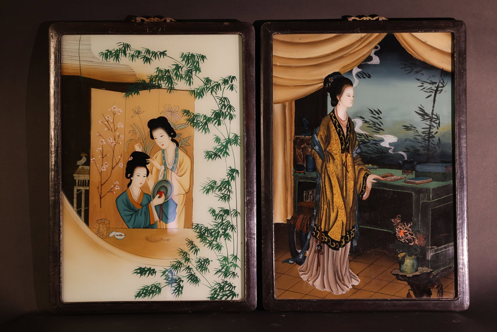 Pair of Late Qing–Republican Reverse Glass Hanging Panels Depicting Court Ladies: Glass intact with no cracks; minor localized paint loss due to age; wooden frame shows wear and aging; hanging hook is intact and ready for display. H 58.5cm W 41cm