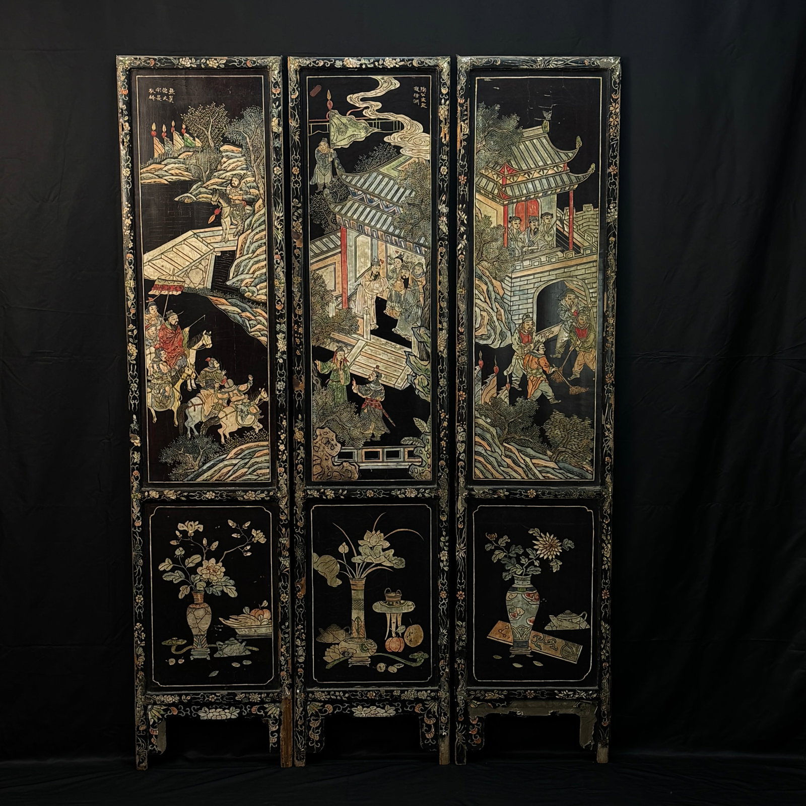 Late Qing black lacquered polychrome three-panel screen, scenes from the Three Kingdoms: Extensive craquelure to lacquer surface with areas of lacquer loss exposing the wood substrate; multiple chips and losses to the base and wear to the wood; some pigment losses and minor damages to the