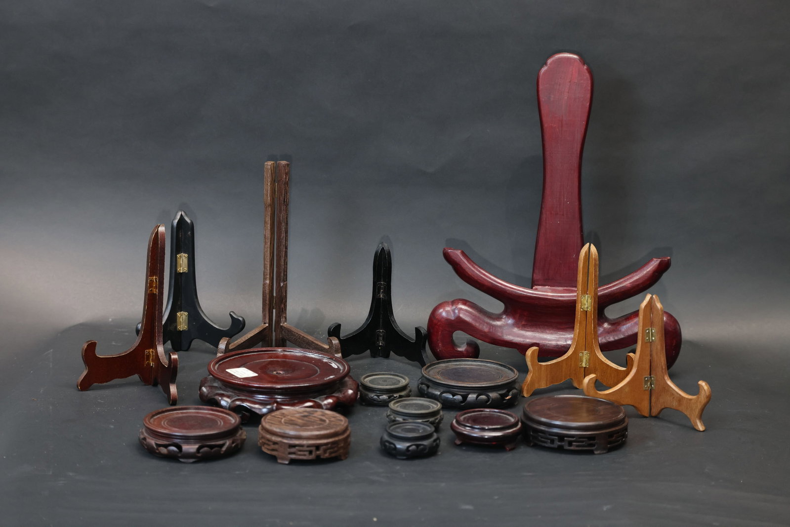 Assorted Set of Antique Wooden Bases and Plate Stands: Mostly complete, with some areas showing age-related wear, paint loss, and minor knocks; hinges intact; a few bases with small age cracks. Overall structurally sound and suitable for use. H 40cm W