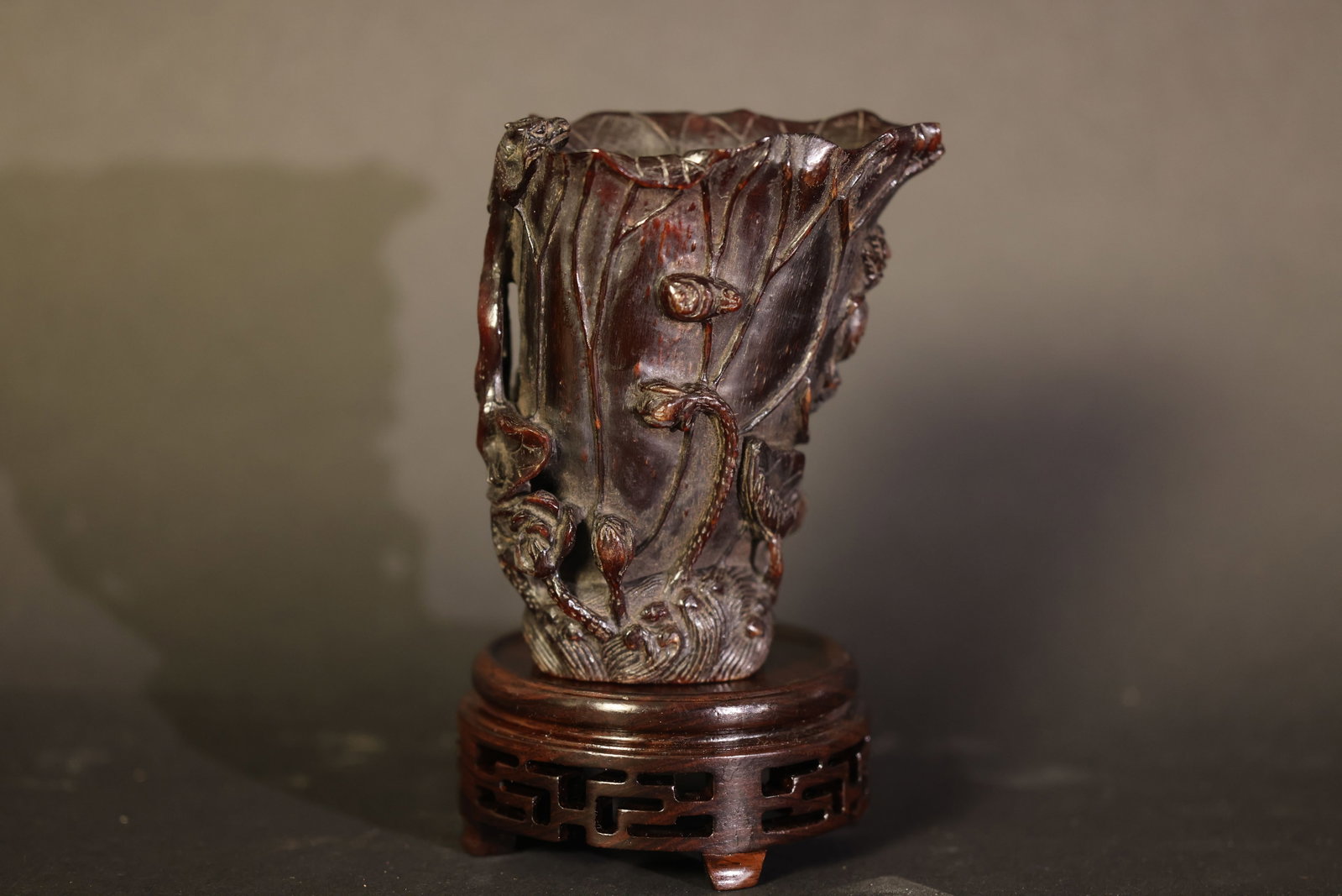 Carved Horn Openwork Lotus?Pond Cup with Chilong and Crab Motifs: Overall structure intact with minor old nicks; small historical restorations to delicate openwork branches; no significant losses. H 11cm W 8.5cm