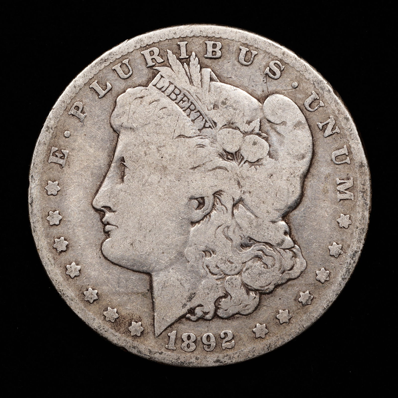 1892-O Morgan Silver Dollar - $1 - Very Good (1 of 2)