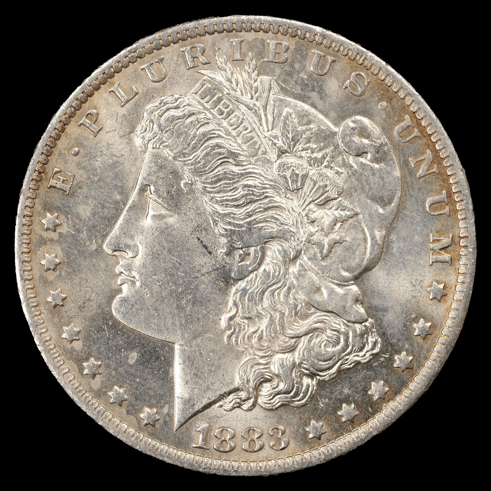 1883-O Morgan Silver Dollar - $1 - About Uncirculated Plus (1 of 2)