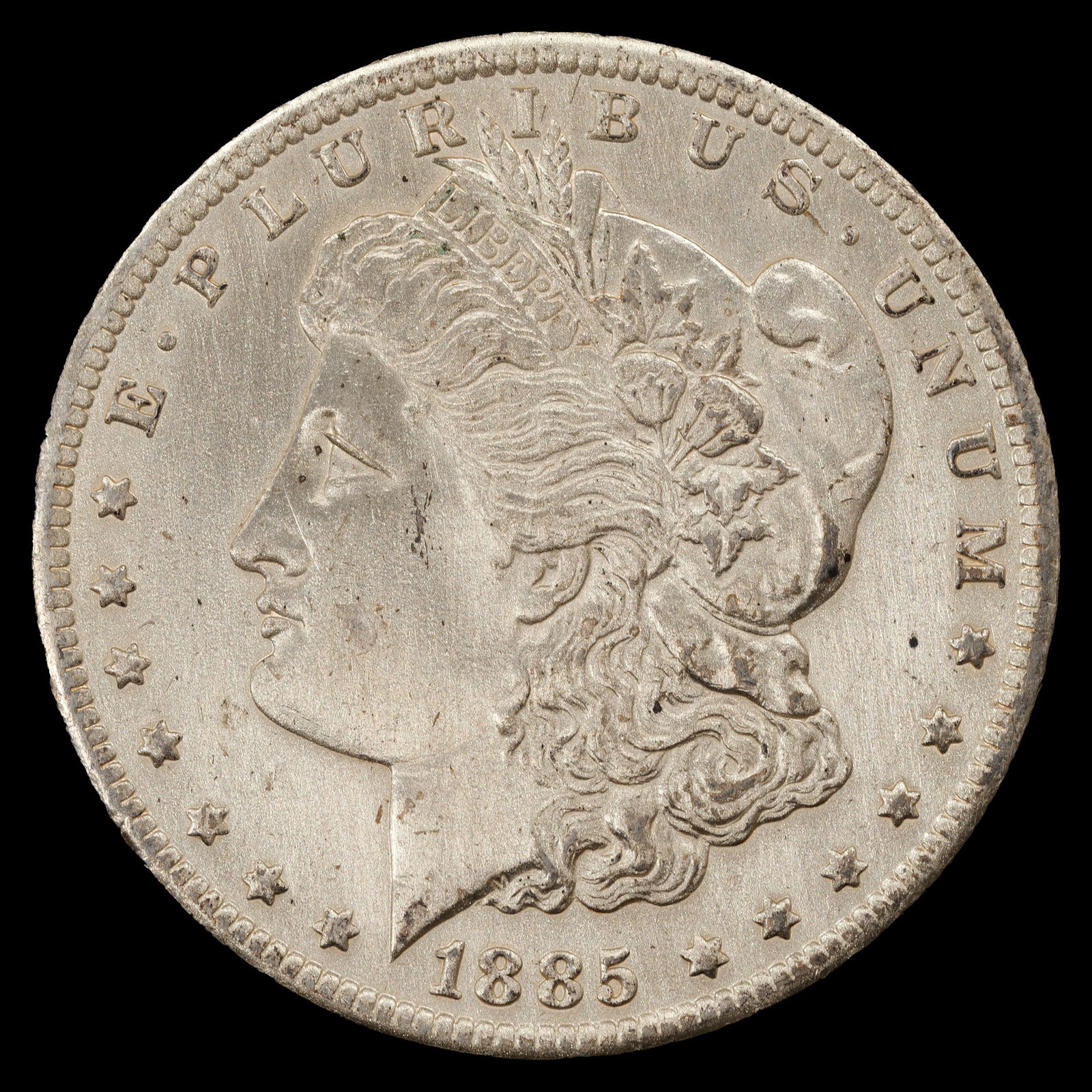 1885-O Morgan Silver Dollar - $1 - About Uncirculated (1 of 2)