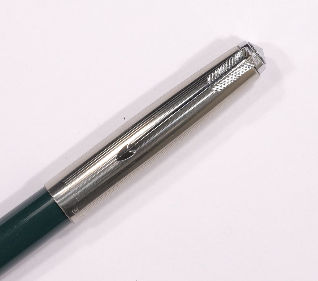 Turquoise Green Fountain Pen: In excellent condition, looks like a Parker, but doesn't have any distinguishable markings other than the capÉ