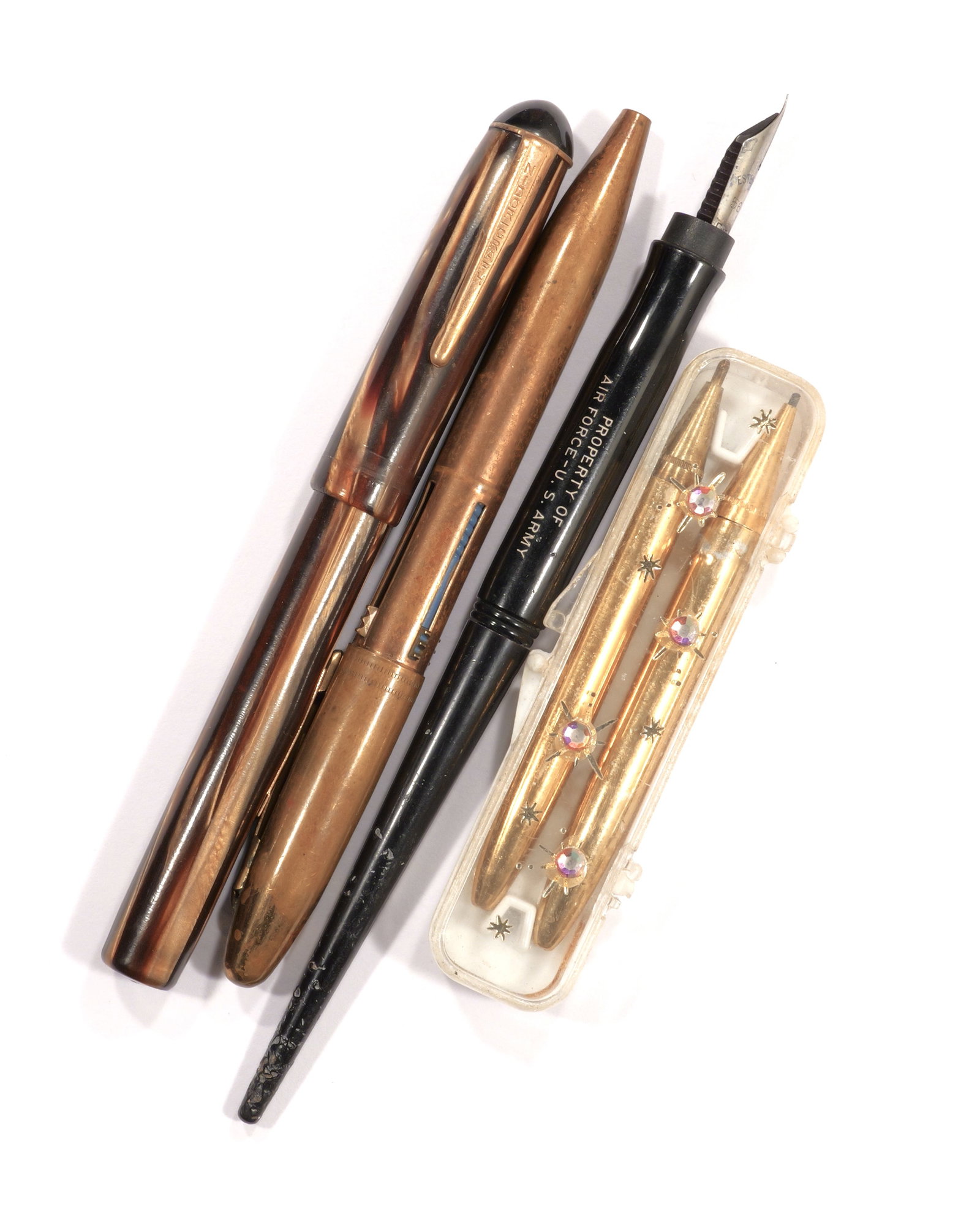 Mixed Lot of Pens - Very Fun!: This mixed lot has a couple of fountain pens (one of with is US Airforce Issue), a multicolor ballpoint pen, and a small bejeweled pen and pencil set. Enjoy!