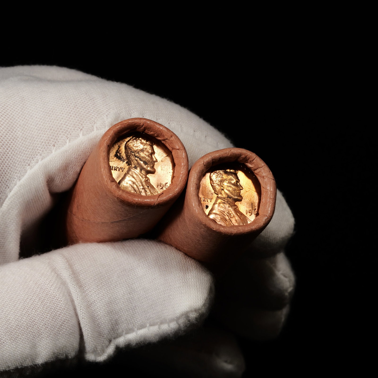 (2) Rolls of 50 Lincoln Memorial Cents 1963 and 1964 - Original Bank Rolls OBW - 1c: Federal Reserve Bank of Cleveland Low Estimate: 10 High Estimate: 10000
