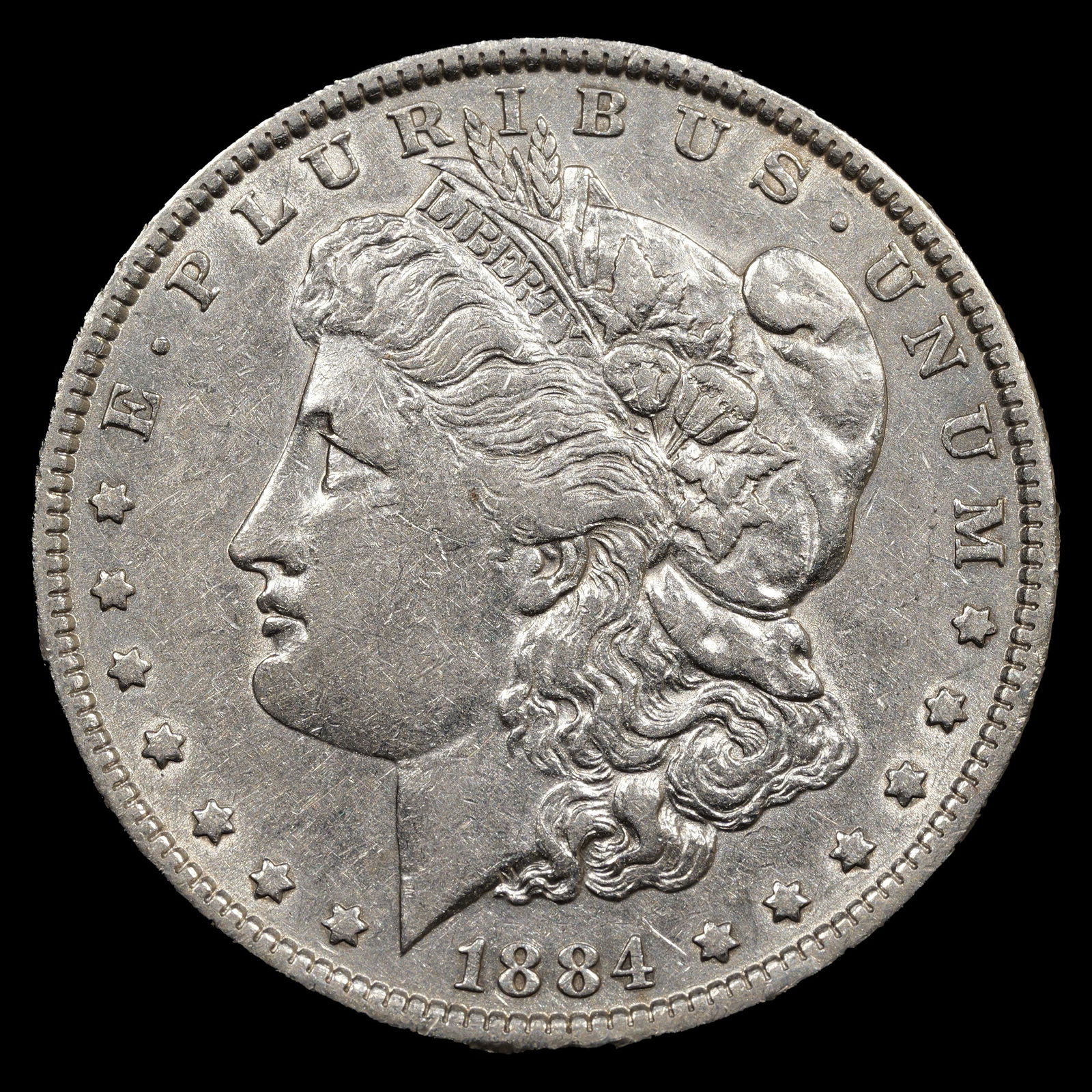1884 Morgan Silver Dollar - $1 - Extra Fine (1 of 2)