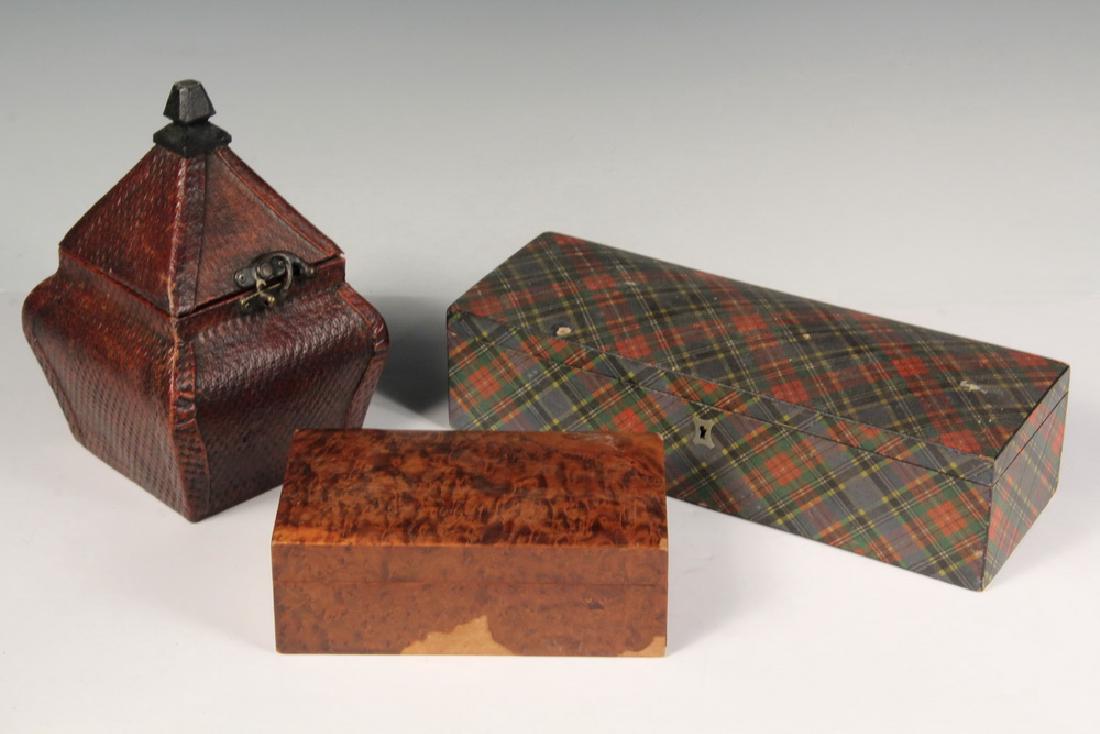 (3) SMALL DECORATIVE BOXES: Including: Mauchline Glove Box in blue tartan, 3" x 11 3/4" x 4", glued hinge, scuffs; PLUS Oblong Domed Top Burled Mahogany Jewelry Box, 2 1/2" x 7" x 4", missing some veneer; PLUS Contemporary Leath