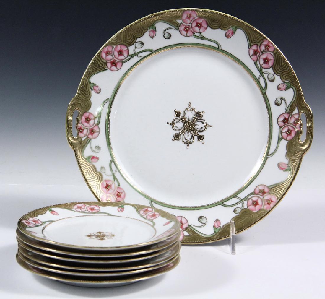 JAPANESE PORCELAIN DESSERT SET: 1930s Nippon Hand Painted and Gilt Cake Plate with (6) Serving Plates, 10" & 6 1/4" diam. Fine condition.
