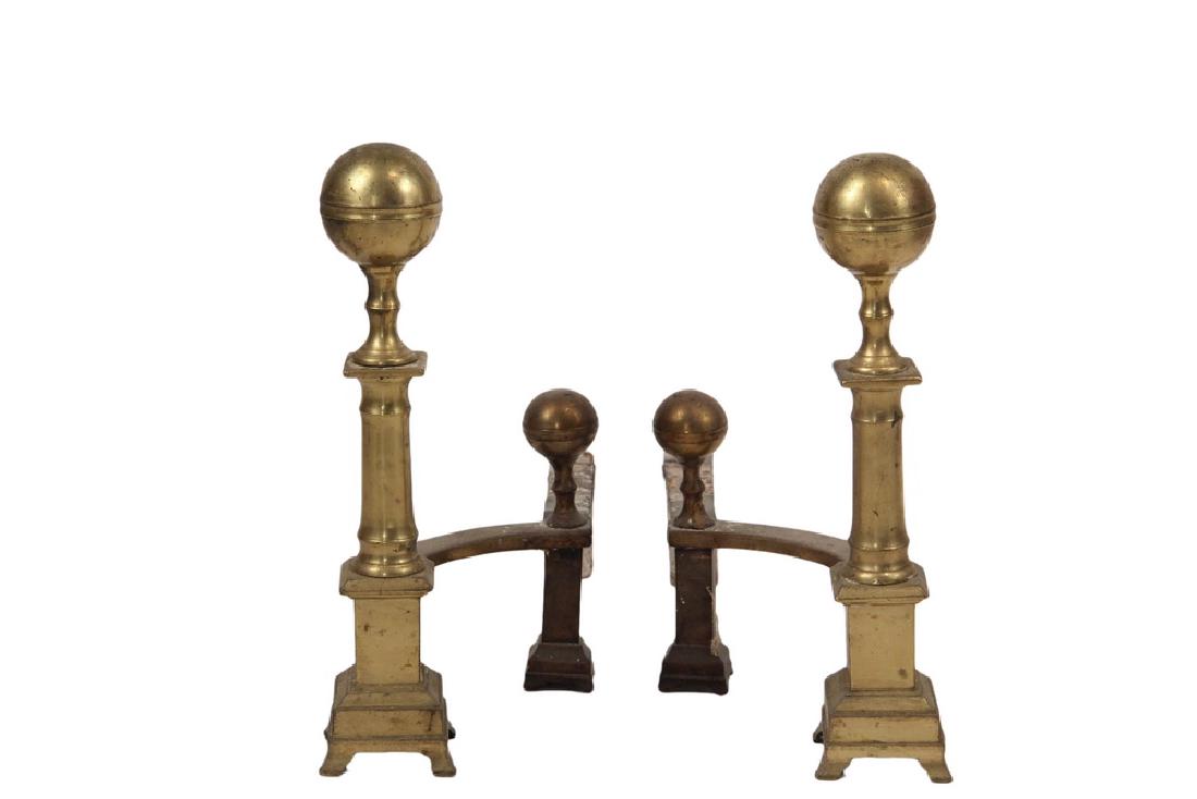 PAIR OF ANDIRONS: 18th c. Brass Andirons, Cannon Ball Top Chippendale with tapered column, square plinth atop molded bracket base, having large log stops, probably Boston, 15 3/4"" x 7" x 18". Scratches.