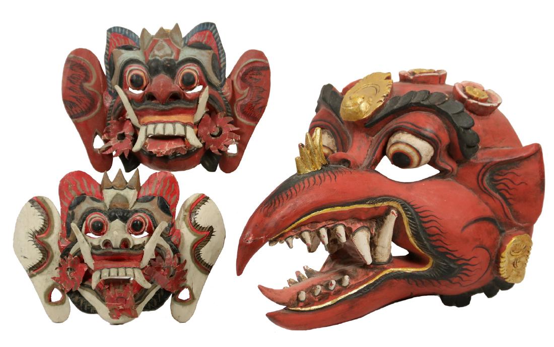 (3) THAI PARADE MASKS: Carved and Painted Wood Demon Masks, one wearable, with jointed beak, the other two for children or for use as wall hangings. 10 1/2" x 15" x 11" & 6 1/2" x 9 1/2" x 2 1/2". Good condition.