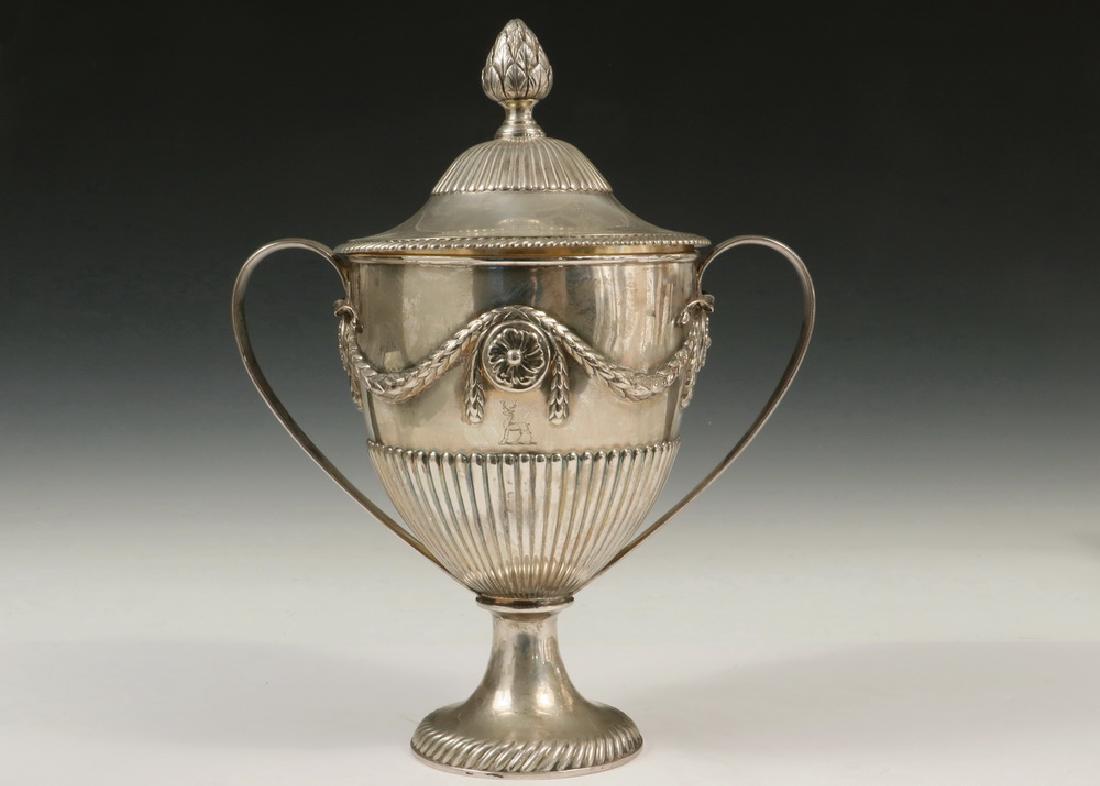 ENGLISH STERLING LIDDED PRESENTATION CUP: George III Period English Sterling Silver Presentation Cup and Cover by John Wakelin & William Taylor, hallmarked for London 1776, with ornate repousse laurel leaf swag and rosettes surrounding the bo