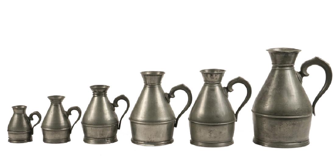 (6 PC) SET OF IRISH PEWTER MEASURES: Group of (6) Graduated Haystack Form Irish Pewter Measures, by Austen & Sons, North Main Street, Cork, early 19th c., all have Austen's lion and crown impressed mark except the largest measure, which